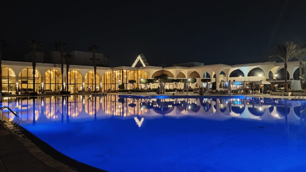 Luxury resort in Egypt with illuminated pool at night
