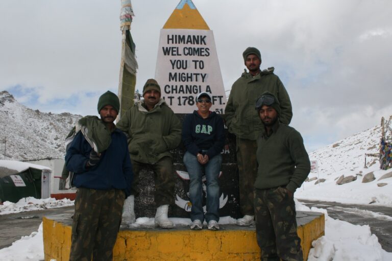 Posing with Indian Army personnel at the snowy Chang La Pass in September
