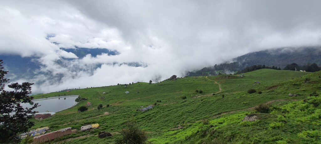 The rolling meadows of Gurson Bugyal disappear into a cloudscape—nature’s perfect stage before the Valley of Flowers.