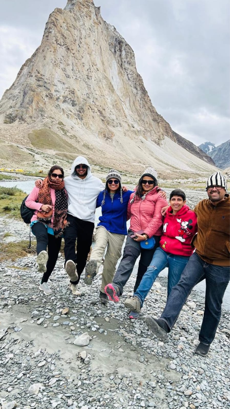 Striking a pose with fellow travellers beneath the mighty Gumbok Rangan