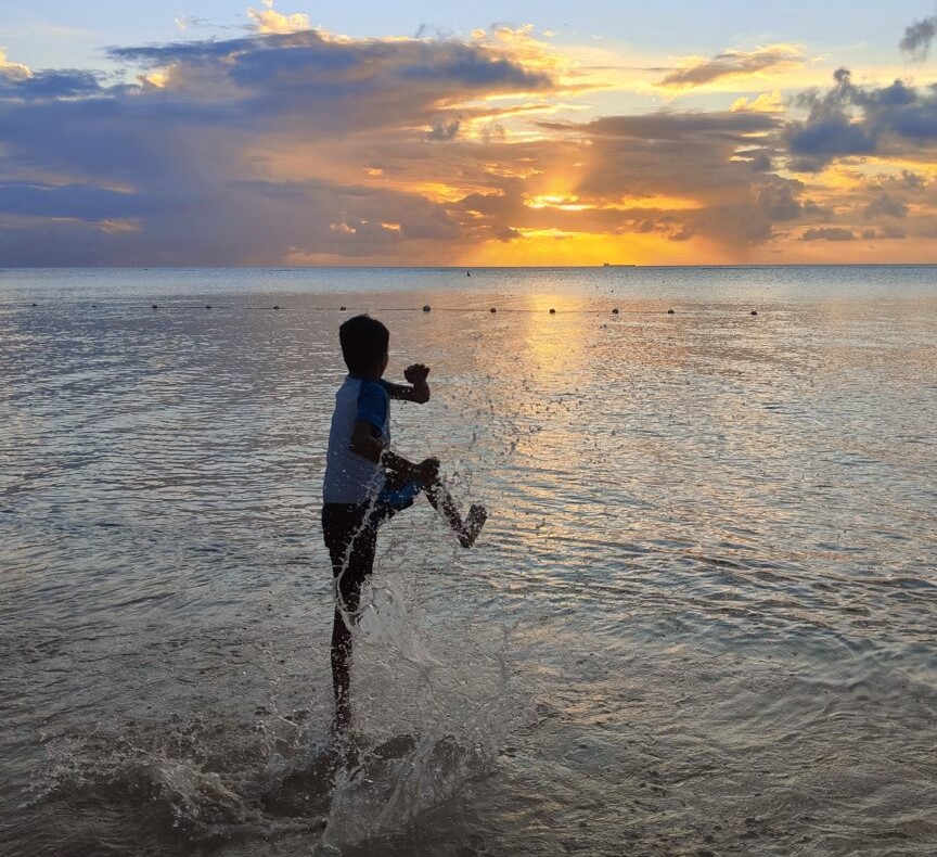 Experience the magic of a Mauritius beach sunset — where golden skies meet turquoise waters, creating the perfect tropical escape.