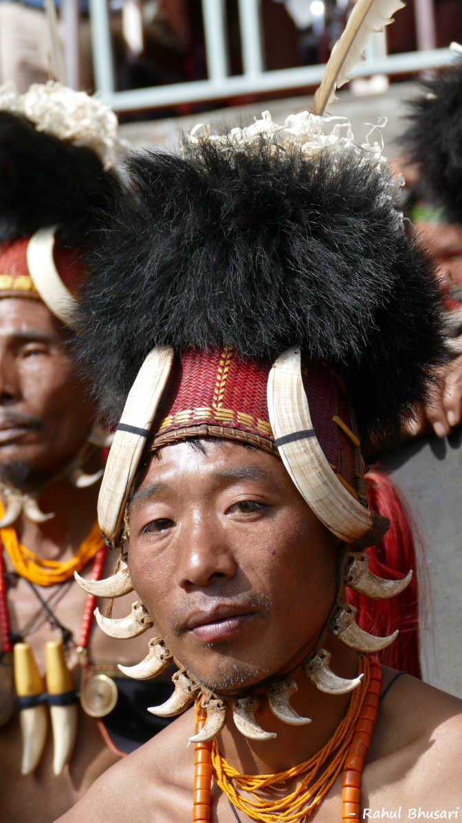 Naga Tribal in traditional costume. Travel to Nagaland for your Holidays. It is a rewarding experience.
