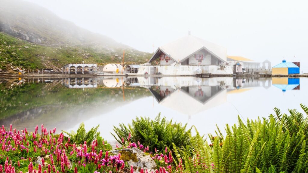 The majestic Hemkund Sahib Gurudwara, a sacred sanctuary perched amidst the stunning Himalayan peaks.(Picture Courtesy : Canva)