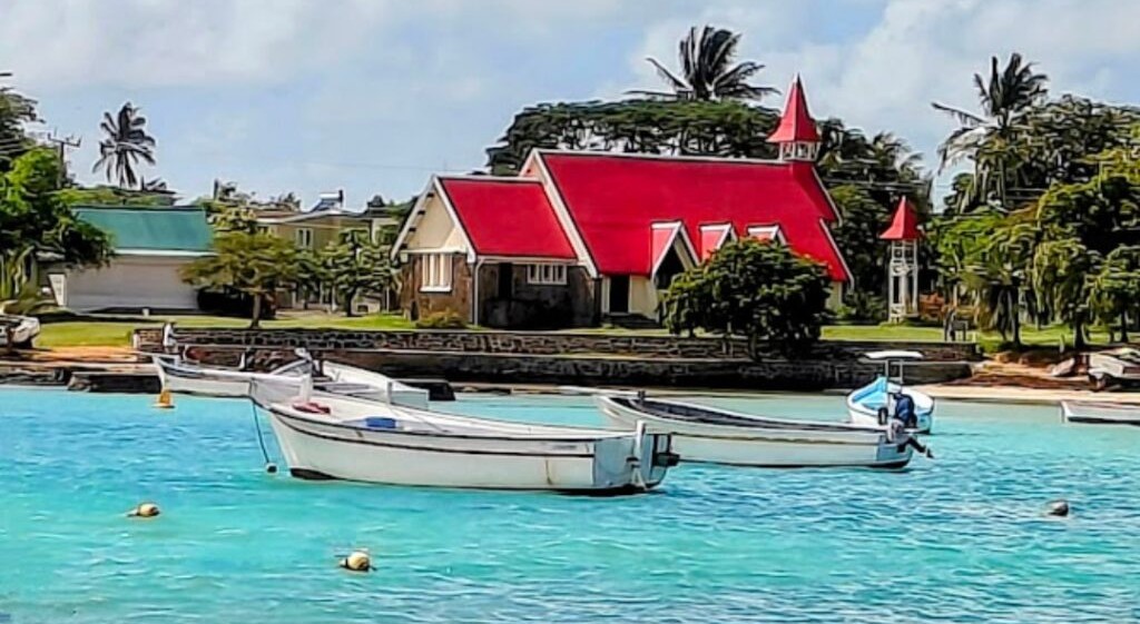 The picture-perfect Notre-Dame Auxiliatrice Church in Cap Malheureux, northern Mauritius, offers a blend of serenity, culture, and postcard-worthy views.