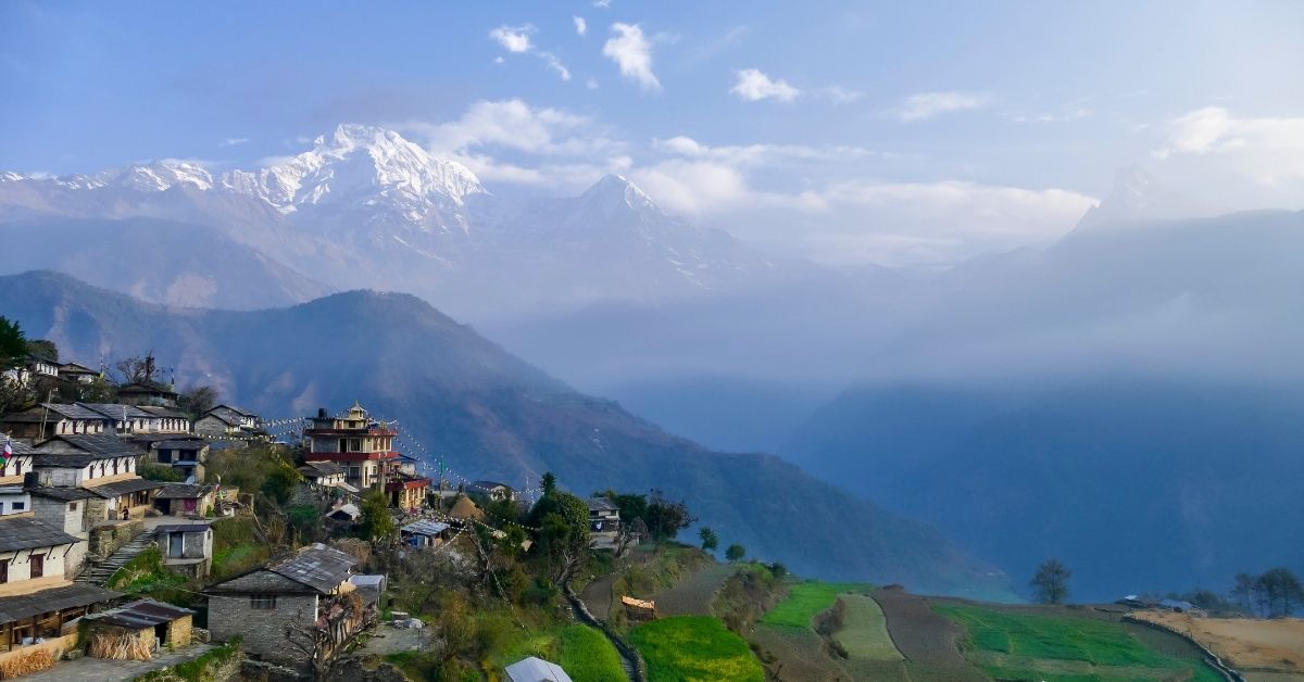 Panoramic view of Ghandruk village with Annapurna and Machapuchare mountains on the Annapurna Base Camp Trek in Nepal.